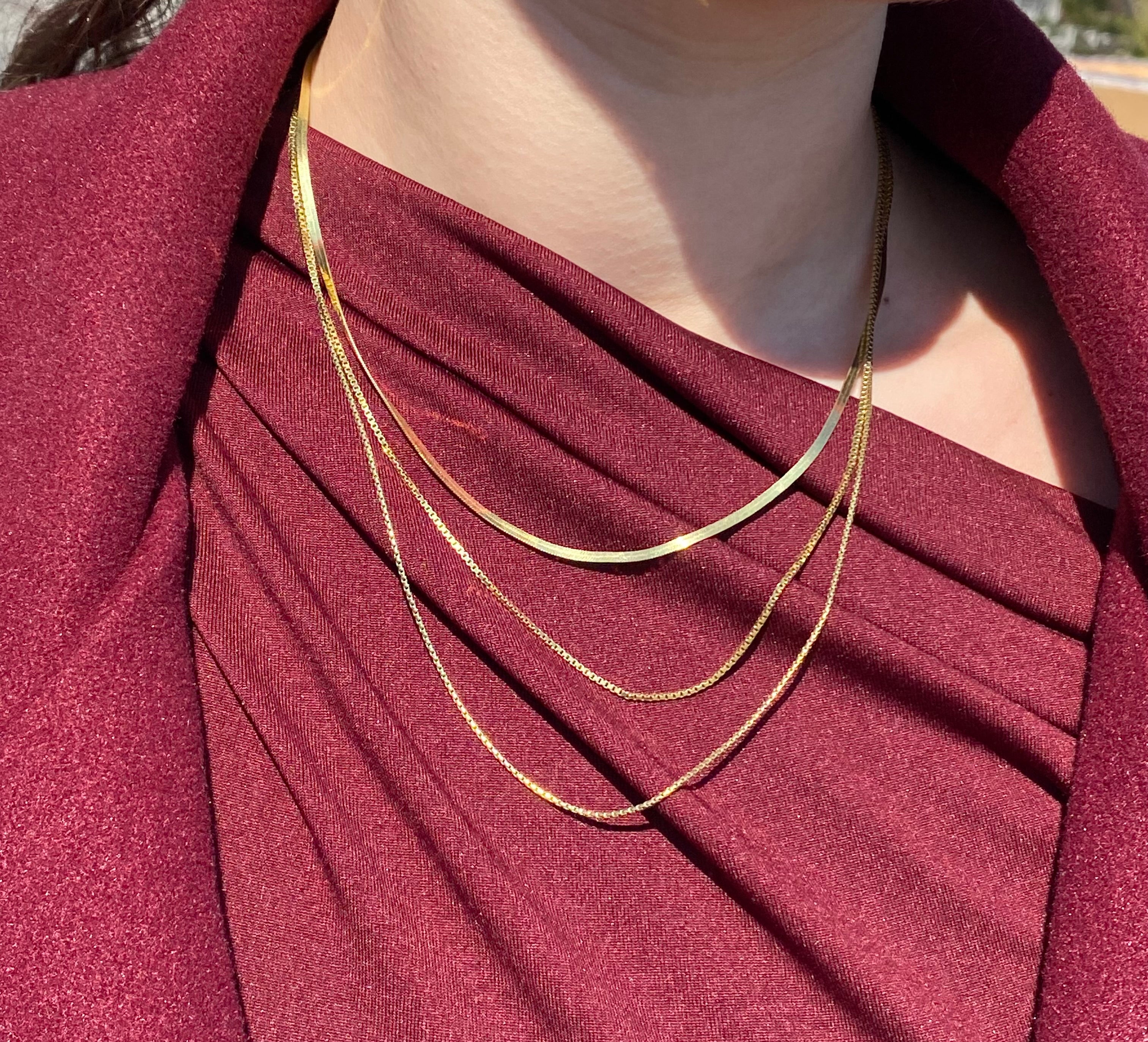 Tris di collane lucenti