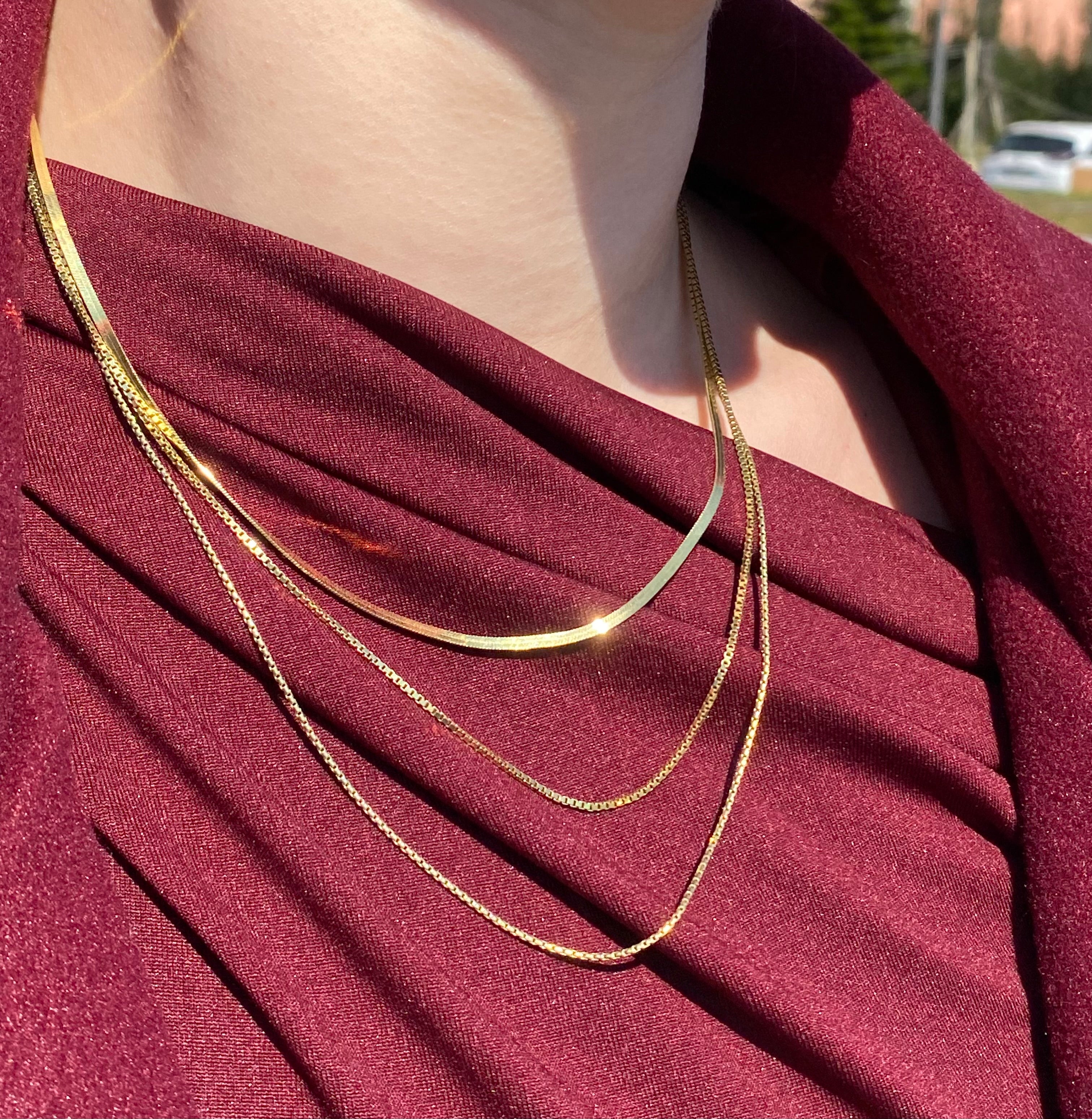 Tris di collane lucenti