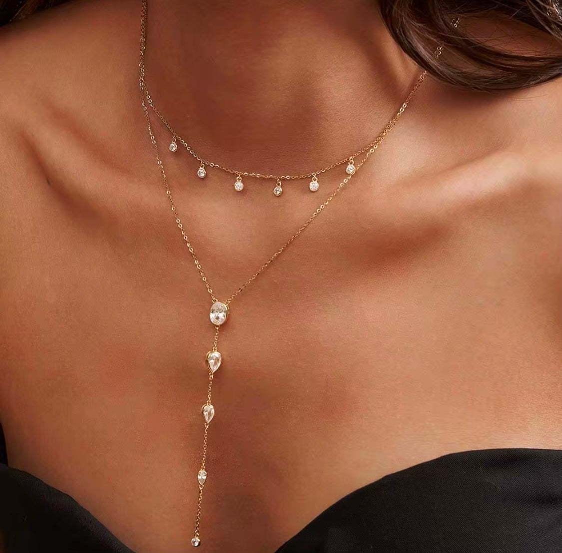 Collana body con charms pendenti