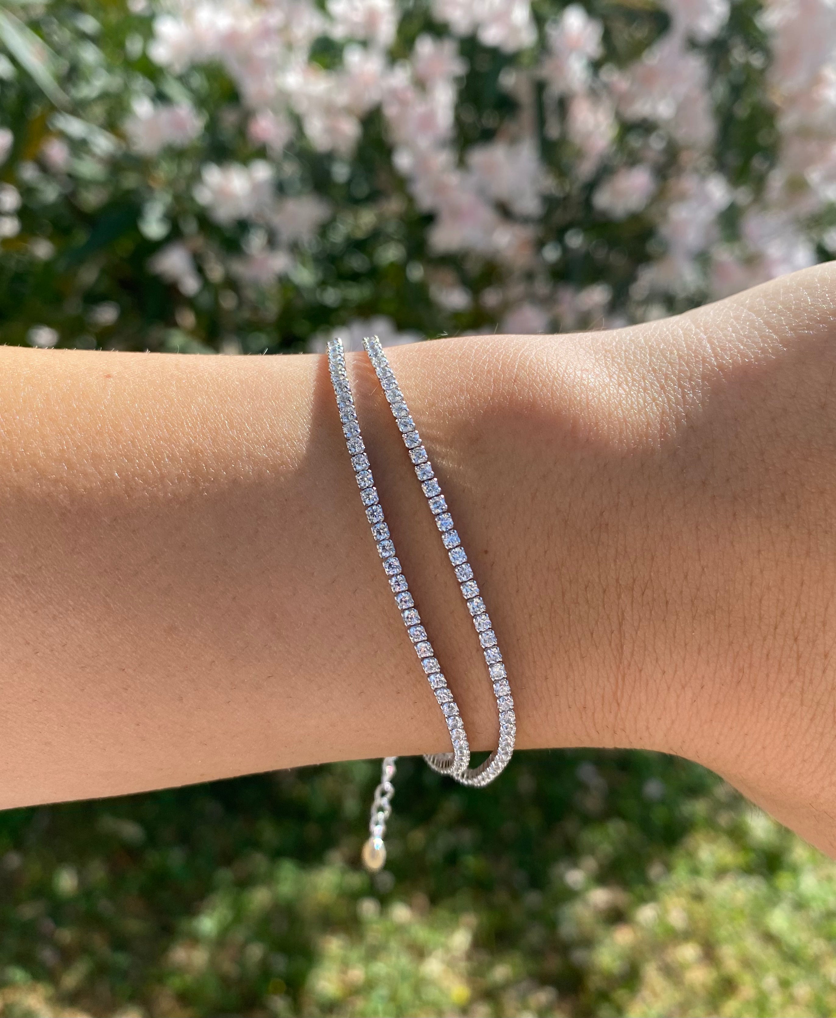 Double twist tennis bracelet